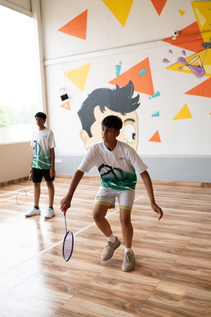 Students playing badminton